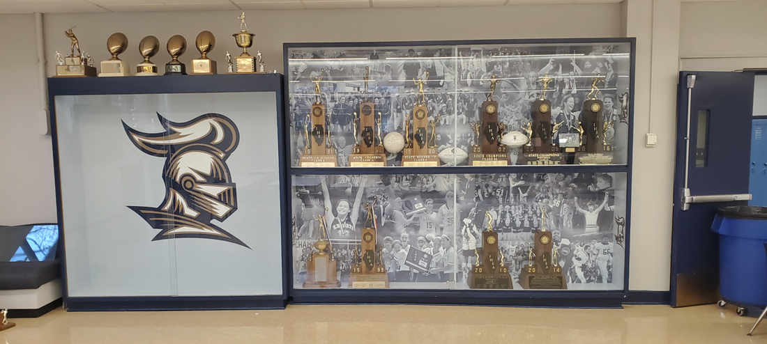 Unique Trophy Case Facelift with Collage of Champions and logo decals -  bannerville (630) 455-0304