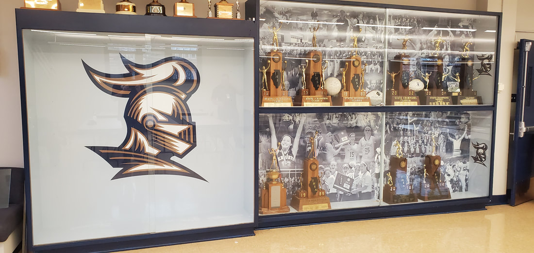 Unique Trophy Case Facelift with Collage of Champions and logo