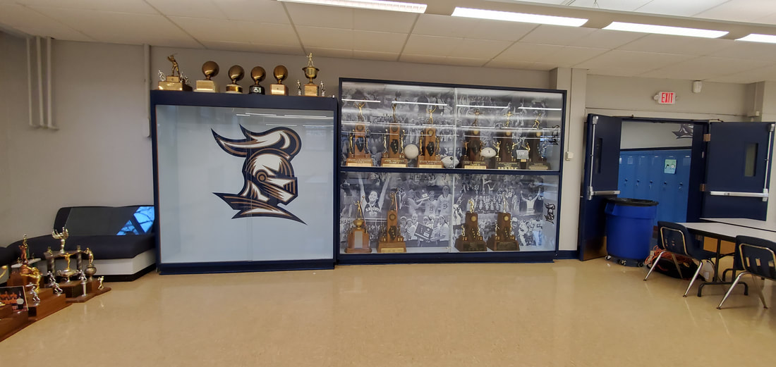 IC Catholic Prep Collage Trophy Case School Mural champions
