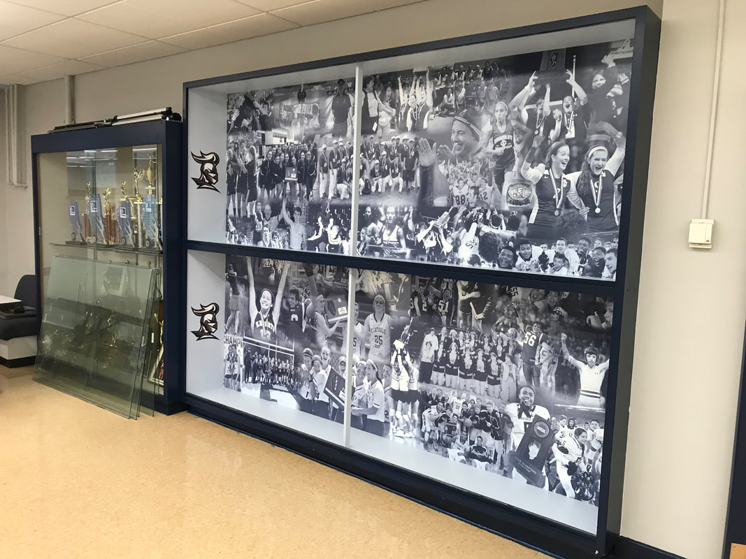 Unique Trophy Case Facelift with Collage of Champions and logo