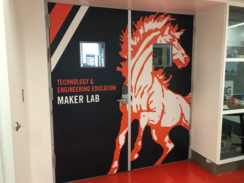 School Branding Stagg High School Chargers Chicago Illinois Education Bannerville Banners Signs Wall Graphics fathead athletics logo graphic design dimensional lettering door wraps