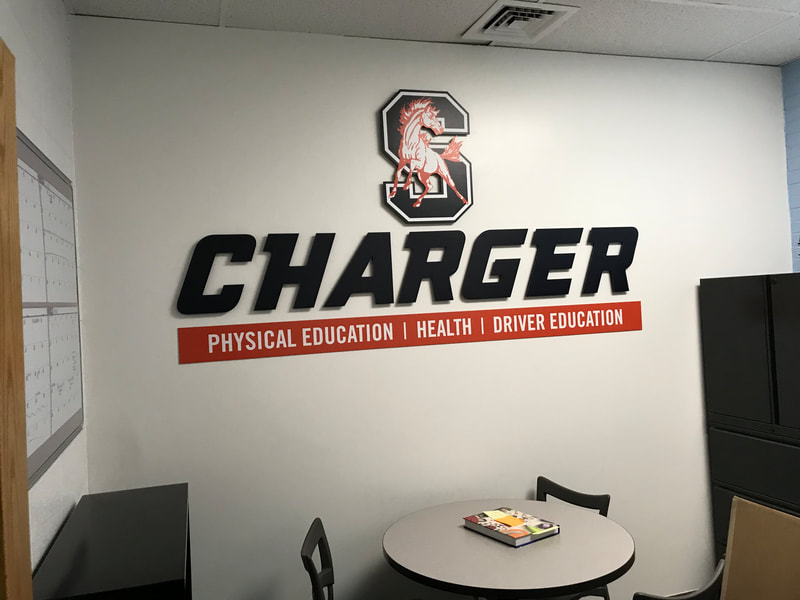 School Branding Stagg High School Chargers Chicago Illinois Education Bannerville Banners Signs Wall Graphics fathead athletics logo graphic design dimensional lettering door wraps chargers drivers education 